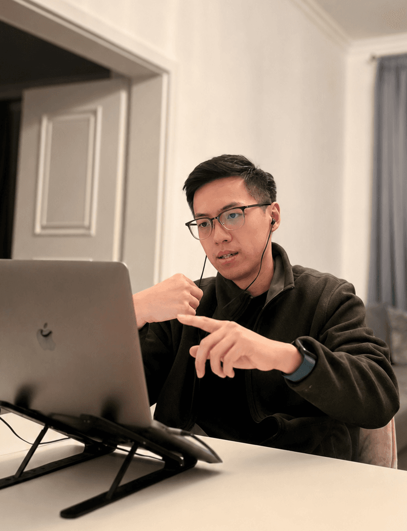 Harris Cheng coaching a client over a video call